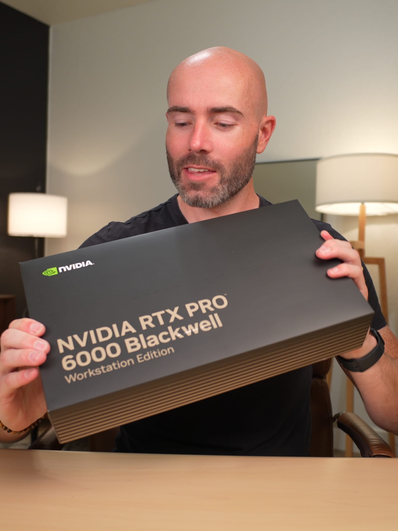 Justin Ryan holding an NVIDIA RTX Pro 6000 Blackwell Workstation Edition
