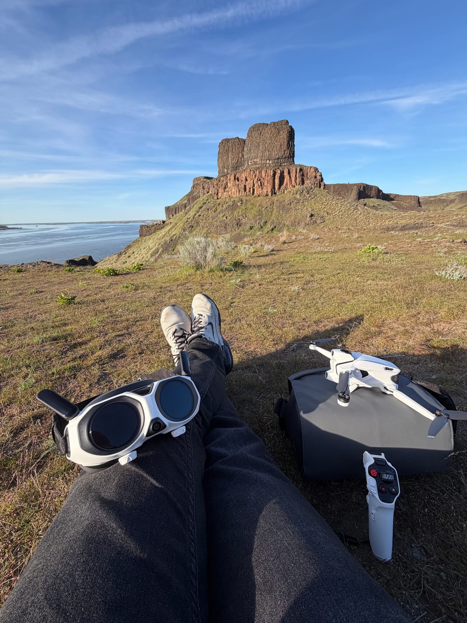 A 360 drone and its goggles below a rock formation